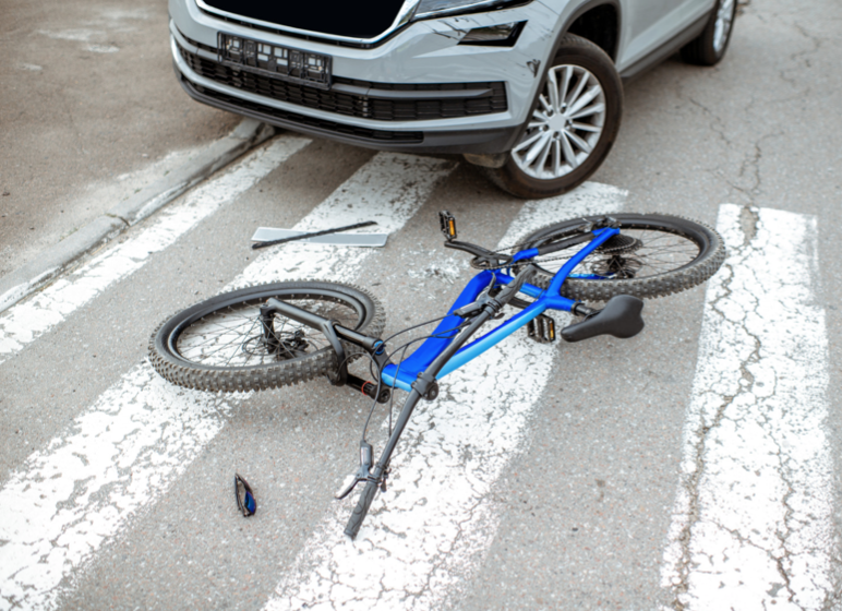 A Car Caused My Bike Accident. Can I Sue?